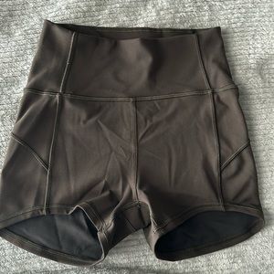Olive green 2.5 inch Lululemon Biker shorts